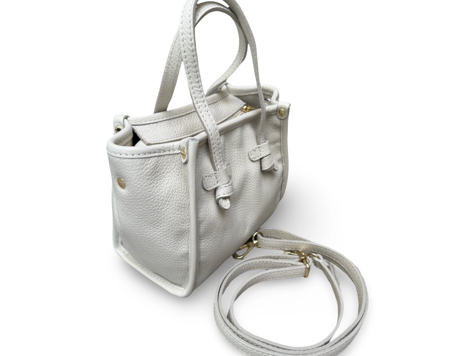 Crèmekleurige leren handtas met knoopdetail - zijaanzicht