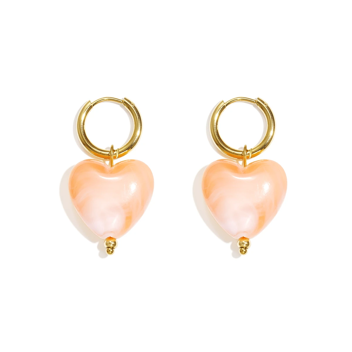 |Oorbellen met hartvormige kraal|Oranje