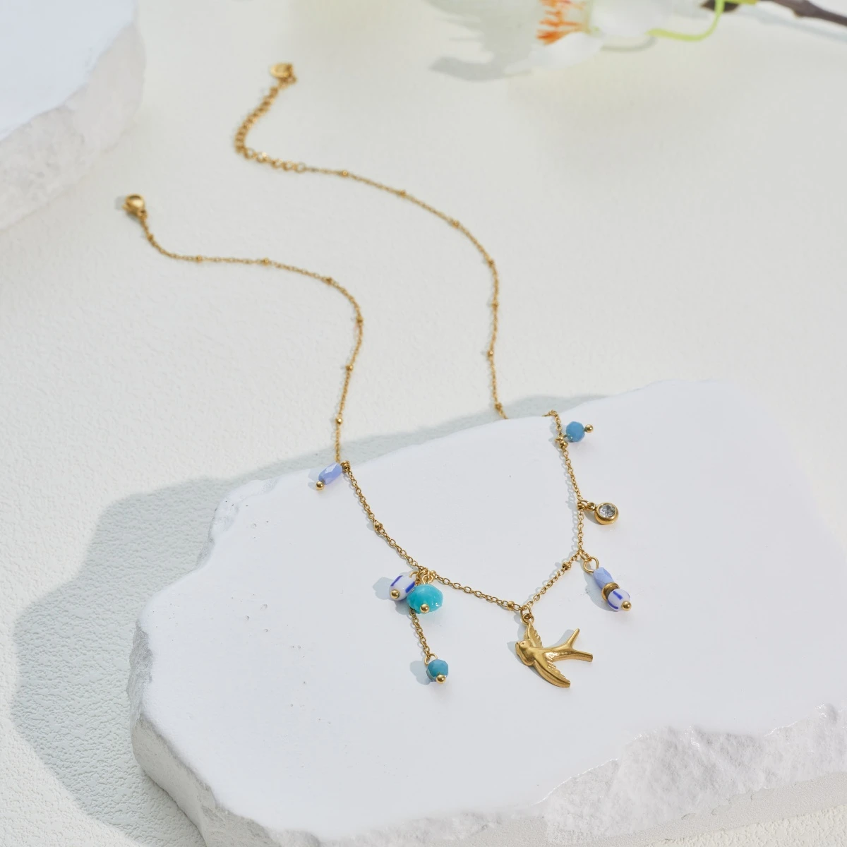 Necklace with swallow and blue beads in stainless steel
